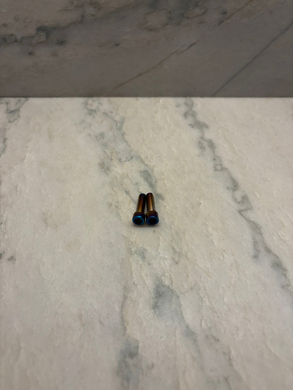 Titanium brake caliper bolts